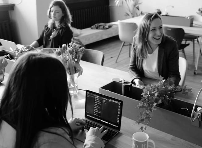 People sitting in front of a computer